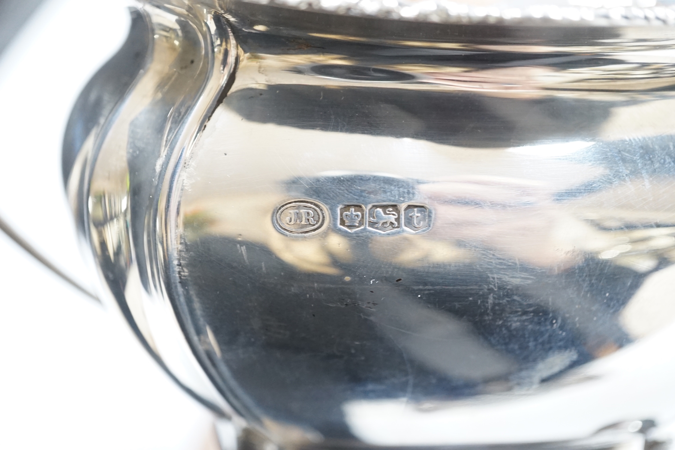 A George V silver four piece tea and coffee service, John Round, Sheffield, 1934/36, gross 63.7oz.